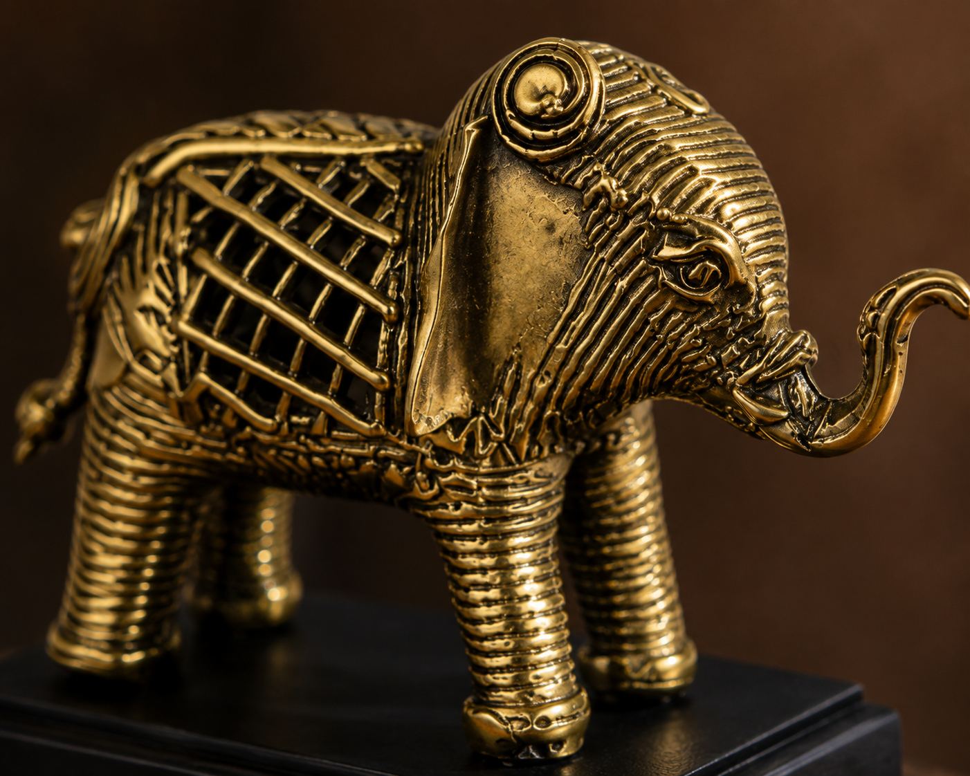 Close-up detail of the Dhokra brass elephant casting