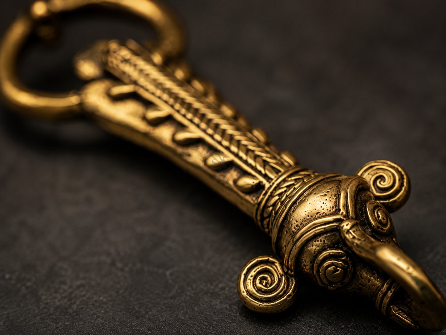 Close-up detail of the Dhokra brass elephant bottle opener